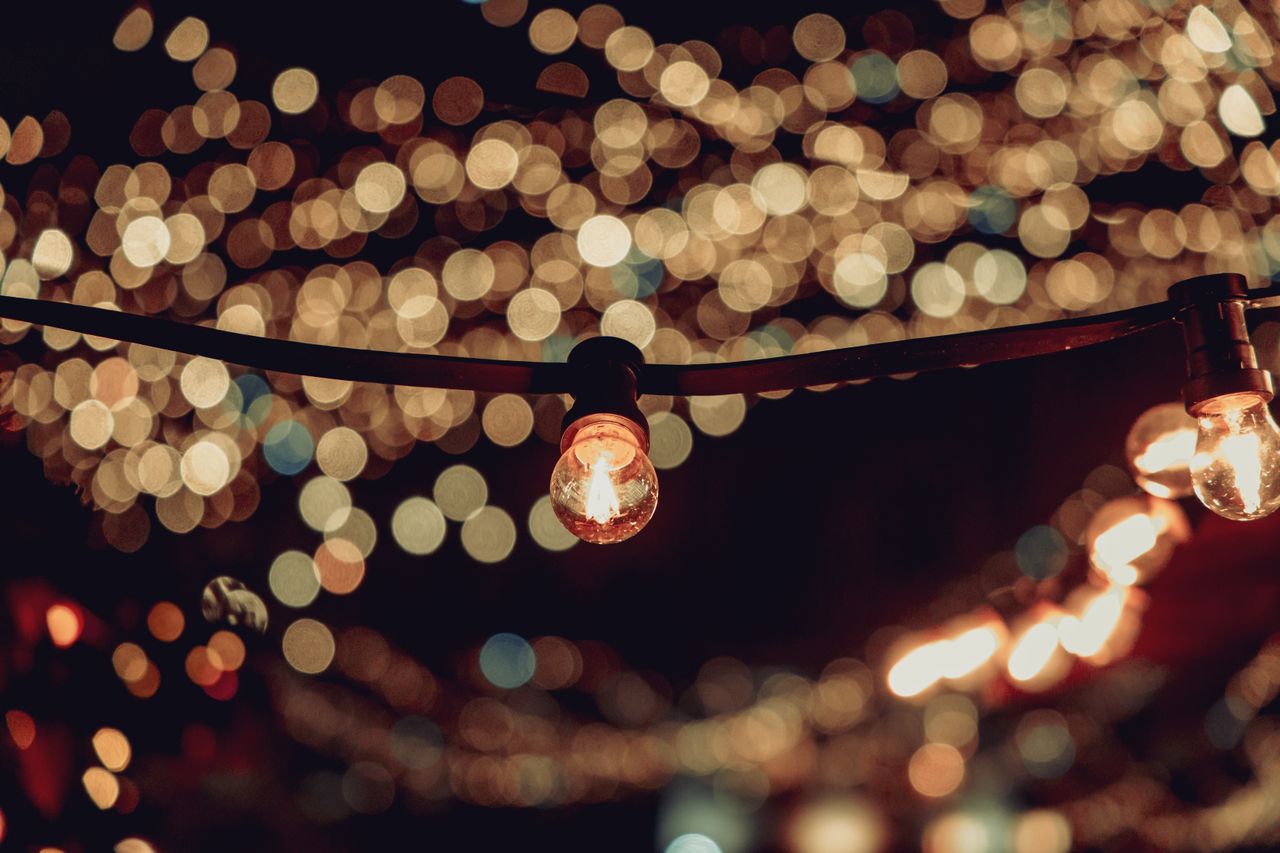 String lights in Warsaw creating a warm, festive atmosphere with a beautiful bokeh effect.